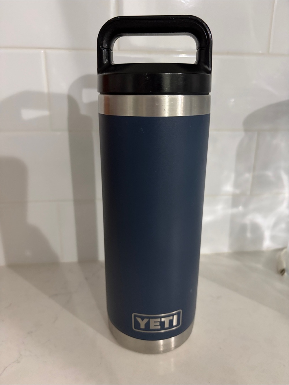 YETI navy blue 18 oz rambler bottle